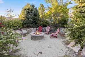 View of yard with a fire pit