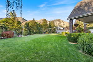 View of yard with a mountain view