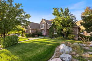 View of front of home with a front lawn