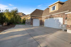 View of property exterior with a mountain view