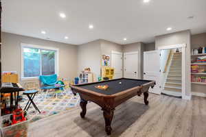 Rec room featuring light hardwood / wood-style flooring and pool table