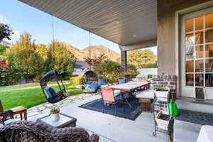 View of patio featuring a mountain view