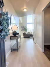 Corridor featuring light hardwood / wood-style floors