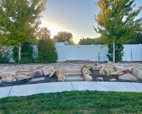 Steps lead up to a sitting area with a perfect view of the Wasatch Mountains