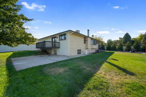 Deck off Kitchen and large cement pad