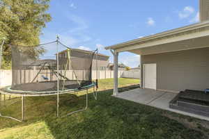 Covered patio and backyard