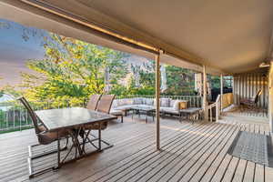 Deck at dusk with partially covered patio