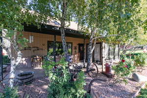 Rear view of property with a patio