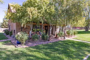 View of front of property with a front lawn