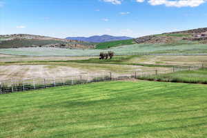 Mountain view with a water view and a rural view