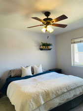 Master Bedroom Carpeted bedroom featuring ceiling fan