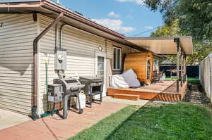 West deck and patio with attached garage entrance