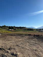 View of mountain feature with a rural view