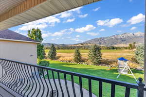 Balcony with a mountain view and a rural view