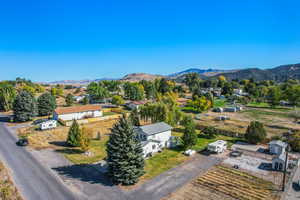 Birds eye view of property with a mountain view