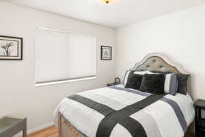 Bedroom with light wood-type flooring