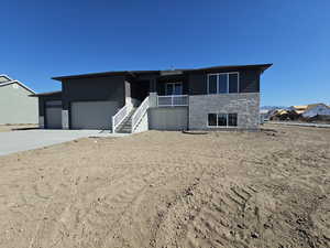 View of front of home with a garage