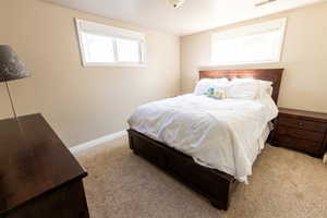 Bedroom with light carpet