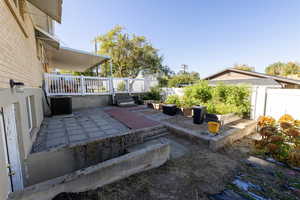 View of patio with central air condition unit