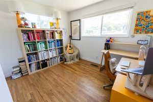 Office featuring wood-type flooring and a wealth of natural light