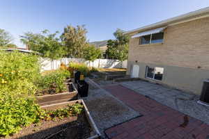 View of patio with a mountain view