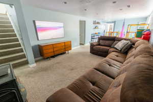 Living room with carpet floors