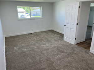 View of carpeted spare room