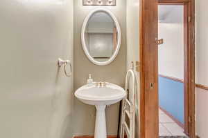 Bathroom featuring tile patterned flooring