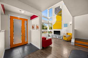 Entrance foyer featuring dark wood-type flooring