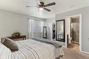 Primary bedroom with en-suite bathroom and large walk-in closet