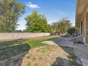 View of yard with a patio