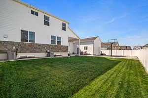 Exterior space with a patio area and central AC