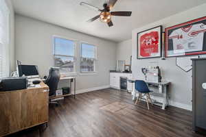 Office space with wine cooler, ceiling fan, dark wood-type flooring, and a textured ceiling