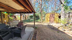 View of patio and shed