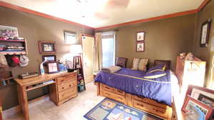 Bedroom with ornamental molding