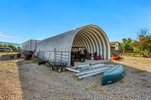 30'x40' shed with 6" cement slab. Seller leaving everything to put up doors.