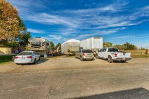 Ample parking for vehicles, trailers, RV's and toys