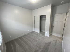 Second-floor bedroom and closet.