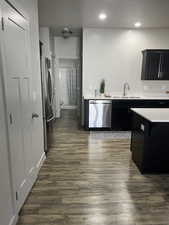 Kitchen leading to second-floor bedroom and bathroom.