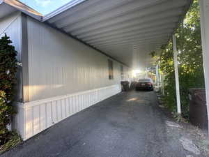 View of car parking with a carport