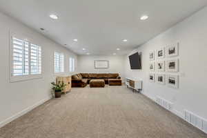 Living room featuring carpet flooring