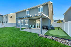 Rear view of property featuring a patio, a lawn, a pergola, and central AC unit