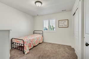 View of carpeted bedroom