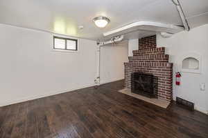 Basement family room has gas fireplace