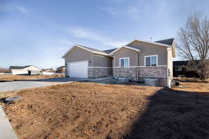 Single story home with a garage