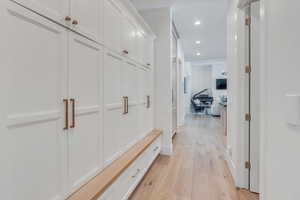 Mudroom with light wood-type flooring