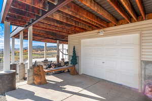 Garage featuring a mountain view