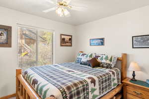 Bedroom featuring ceiling fan