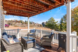 Trex deck featuring an outdoor hangout area