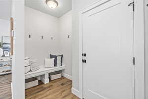 Mudroom featuring hardwood / wood-style flooring